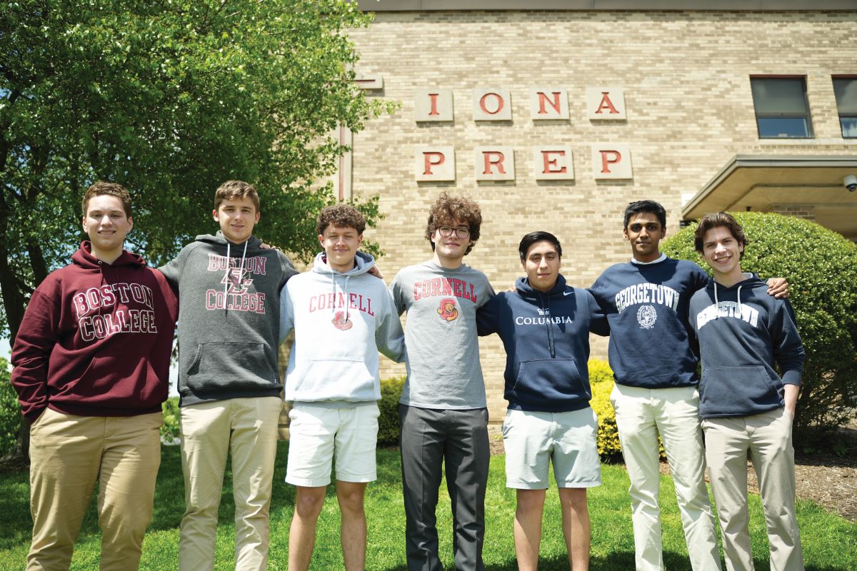 Students with college sweatshirts